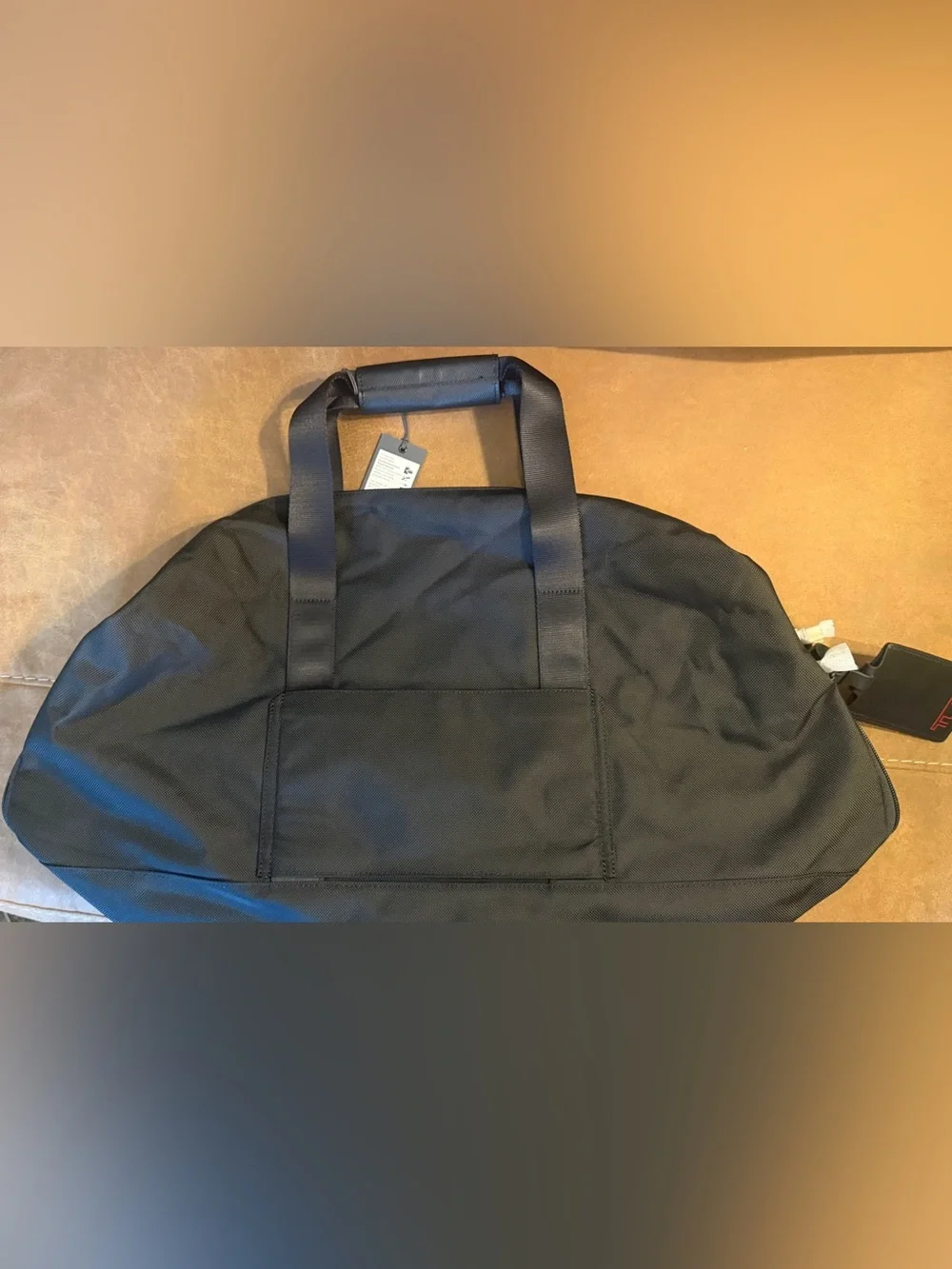 Tumi impressive 13